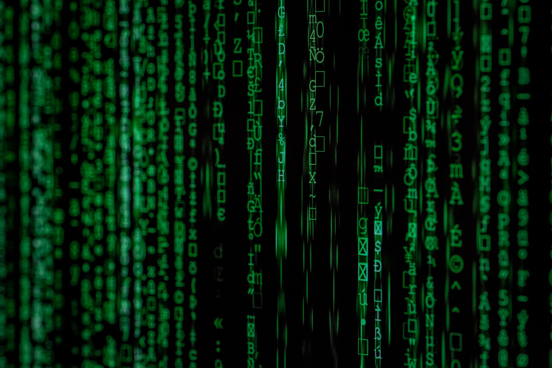 Pexels Markus Spiske 1089438 Green code on a black background.