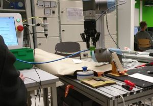 Cobot doing some lifting.