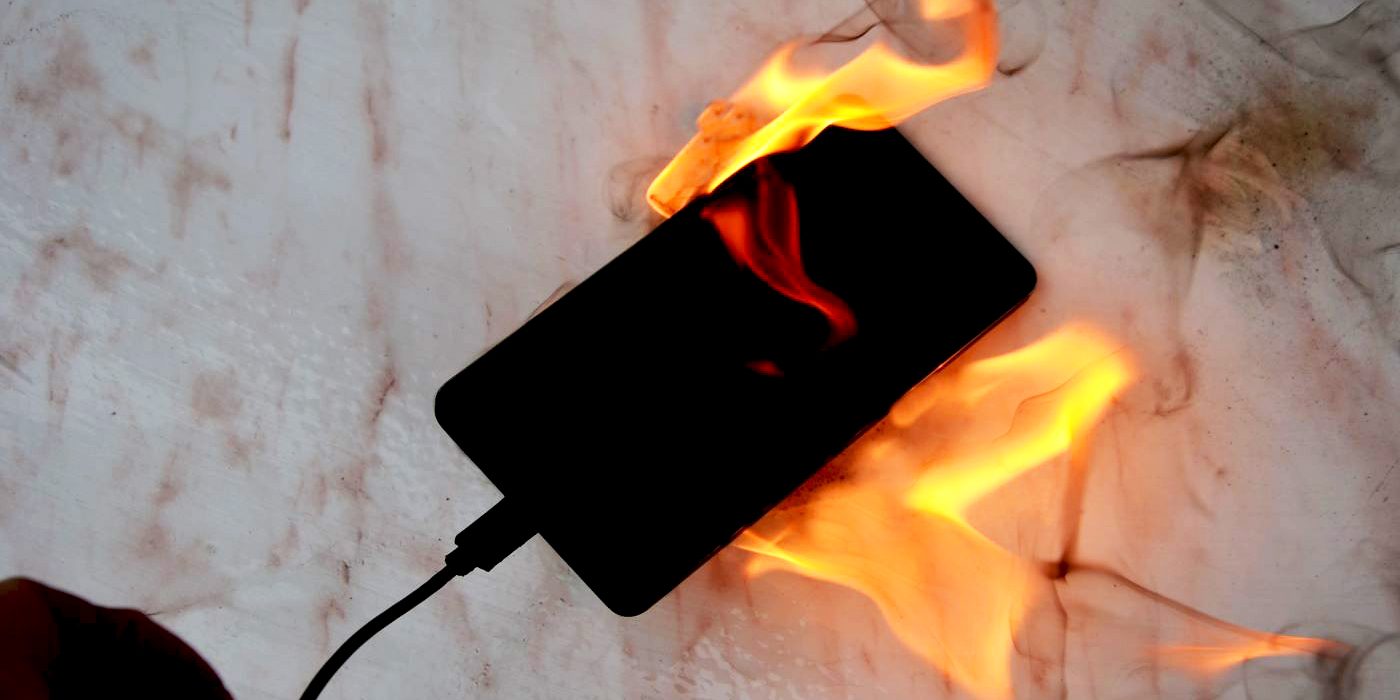 The picture shows a mobile phone on fire.