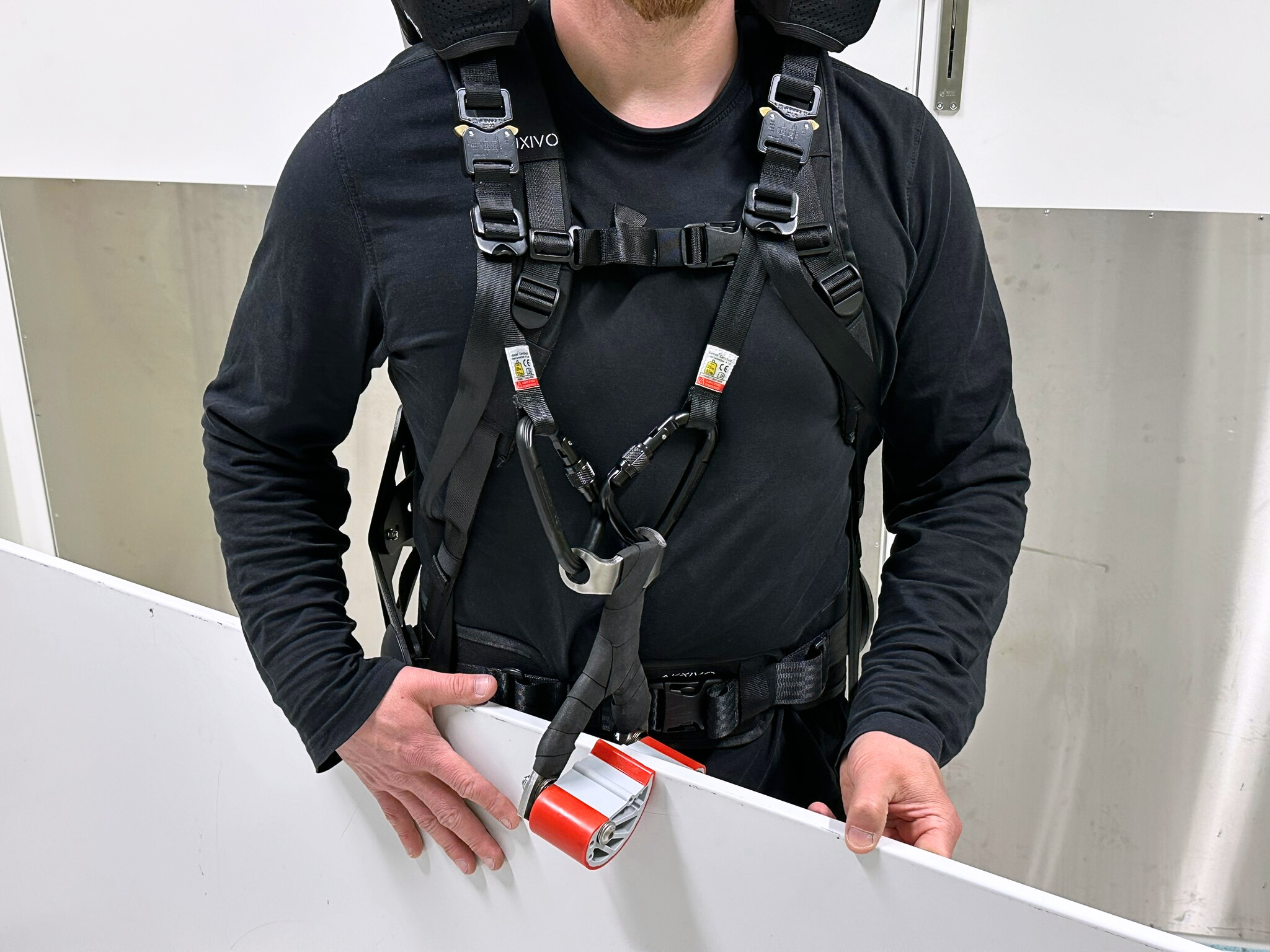 44f16bf7 10a5 44bd 8f9a 5ea4d7d7264e A close-up of man wearing an exoskeleton