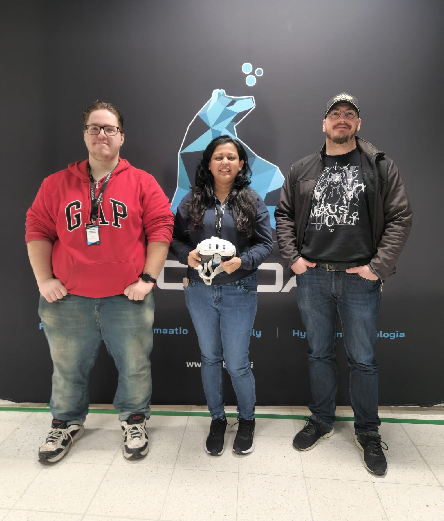 Three academy students posing for camera.