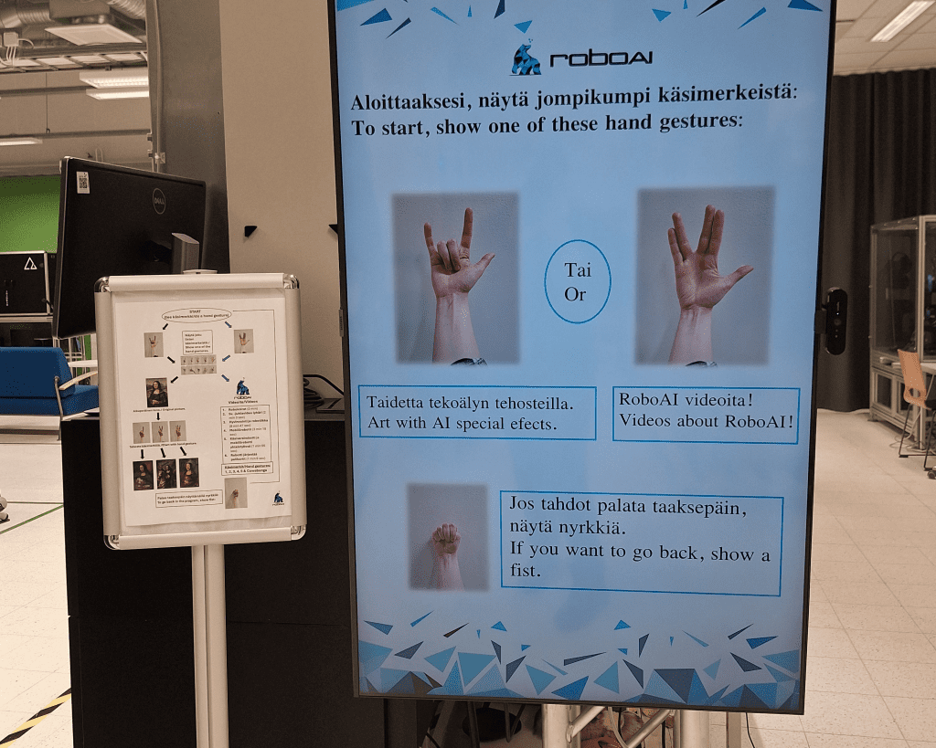 Lähikuvassa installaatiossa käytetty interaktiivinen näyttö ja sen käytön ohjeet.