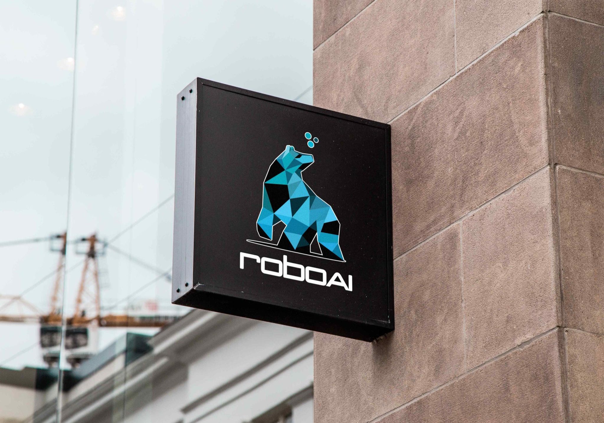 A sign on the wall with RoboAI logo.